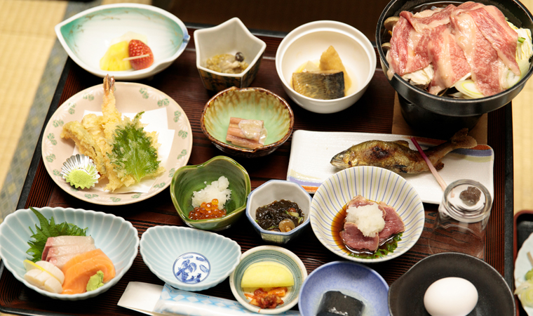 The 2 are satisfied with the portions and taste of the Yamagata Beef Sukiyaki and Grilled Sweetfish.