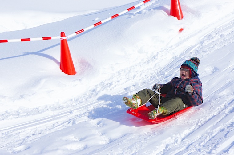 Riding a sleigh over powder snow is absolutely the best!